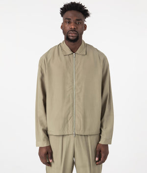 MKI Oversized Tencel Rider Jacket in Sage Green. Front angle shot at EQVVS.