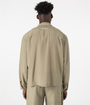 MKI Oversized Tencel Rider Jacket in Sage Green. Back angle shot at EQVVS.