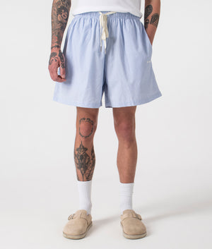 Relaxed Fit Striped Shorts in Blue by MKI MIYUKI ZOKU. EQVVS Front Angle Model Shot.