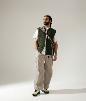 Polo Ralph Lauren Quilted Hybrid Vest in Armadillo Green and Windsor Heather. Shot at EQVVS.