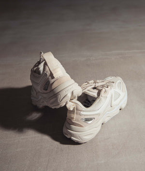 Satellite Runner Sneakers in White by Axel Arigato. EQVVS Menswear. campaign Shot.