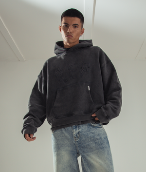 Rep Applique Hoodie in Vintage Black by Represent. EQVVS campaign Shot. 