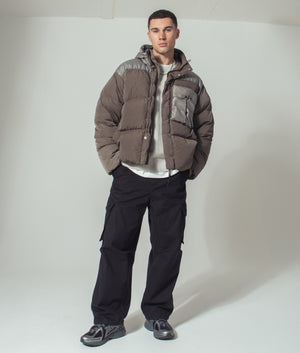 Eco Chrome-R Mixed Goggle Down Jacket in Walnut by CP Company. EQVVS Menswear. Campaign shot.