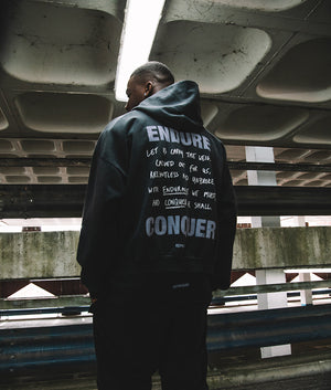 Campaign Image Atlas Hoodie in Stained Black by Represent with chest and back print. EQVVS Model Shot. 