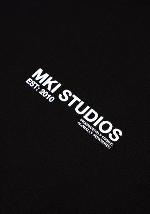 MKI Miyuki Zoku Abstract Crewneck Sweatshirt in Black. Shot at EQVVS.  Detail shot. 