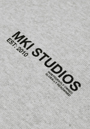 MKI Miyuki Zoku Abstract Crewneck Sweatshirt in Grey. Shot at EQVVS. Detail shot. 