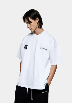 MKI Miyuki Zoku Abstract T-Shirt in White. Shot at EQVVS. Front model shot. 