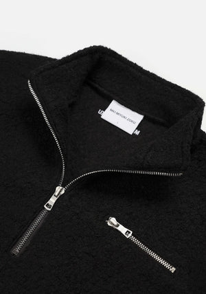 MKI Miyuki Zoku Black Boucle Quarter Zip Jumper Flat shot. 
