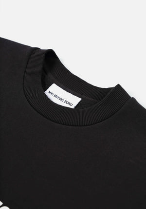 MKI Miyuki Zoku Linear Crewneck Sweatshirt in Black. Shot at EQVVS.  Detail shot. 