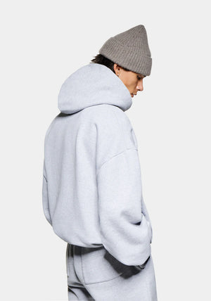 MKI Miyuki Zoku Linear Hoodie in Grey. Shot at EQVVS. Model back shot. 