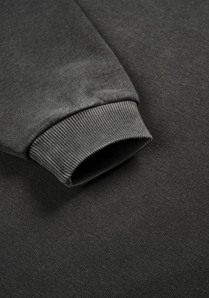 MKI Miyuki Zoku Uniform Crew Sweatshirt in Pigment Black. Shot at EQVVS.  Detail shot. 