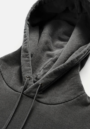 MKI Miyuki Zoku Uniform Hoodie in Pigment Black. Shot at EQVVS. Detail shot. 