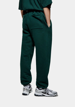 MKI Miyuki Zoku Uniform Joggers in Green. Shot at EQVVS. Back shot. 