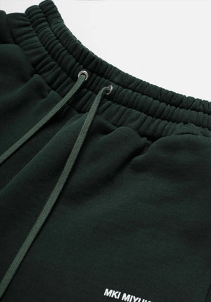 MKI Miyuki Zoku Uniform Joggers in Green. Shot at EQVVS. Detail shot. 