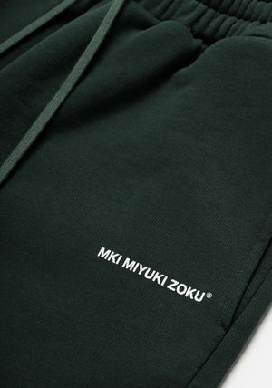 MKI Miyuki Zoku Uniform Joggers in Green. Shot at EQVVS.  Detail shot. 