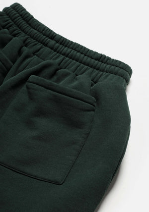 MKI Miyuki Zoku Uniform Joggers in Green. Shot at EQVVS. Detail shot. 