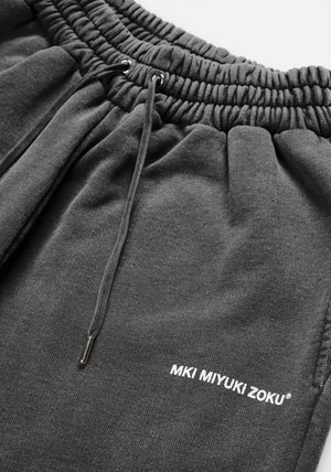 MKI Miyuki Zoku Uniform Joggers in Pgment Black. Shot at EQVVS.  Detail shot. 