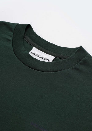 MKI Miyuki Zoku Long Sleeve Uniform T-Shirt in Green. Shot at EQVVS.  Detail shot. 