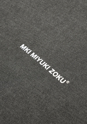 MKI Miyuki Zoku Long Sleeve Uniform T-Shirt in Pigment Black. Shot at EQVVS.  Detail shot. 