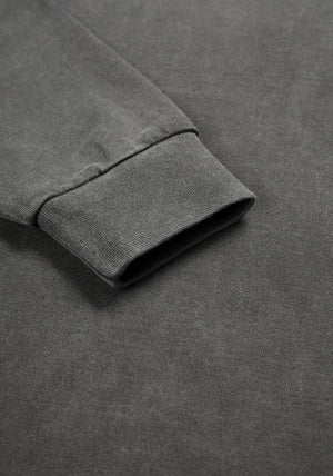 MKI Miyuki Zoku Long Sleeve Uniform T-Shirt in Pigment Black. Shot at EQVVS. Detail shot. 