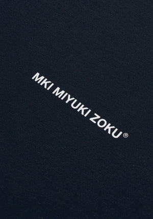 MKI Miyuki Zoku Uniform T-Shirt in Navy. Shot at EQVVS. Detail shot. 