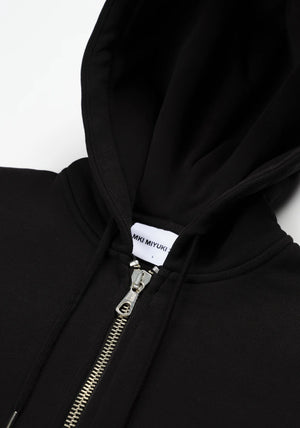 MKI Miyuki Zoku Uniform Zip Through Hoodie in Black. Shot at EQVVS. Detail shot. 