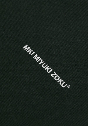 MKI Miyuki Zoku Uniform Zip Through Hoodie in Green. Shot at EQVVS.  Detail shot. 