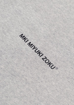 MKI Miyuki Zoku Uniform Zip Through Hoodie in Grey. Shot at EQVVS.  Detail shot. 