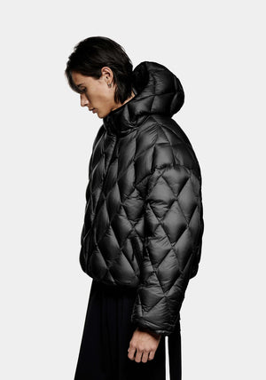 Diamond Bubble Jacket in black by MKI Miyuki Zoku. Model shot. 