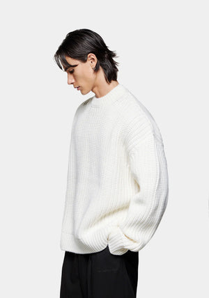 MKI Miyuki Zoku Chunky Rib Knit Crewneck Jumper in Off White. Model Angle Shot.