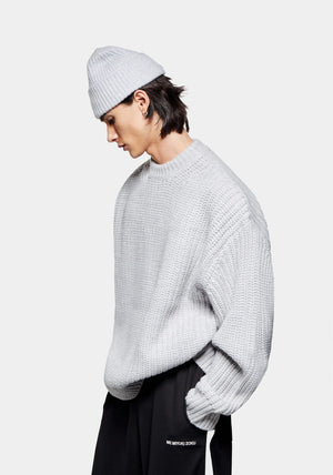 MKI Miyuki Zoku Chunky Rib Knit Crewneck Jumper in Grey. Model Angle Shot.