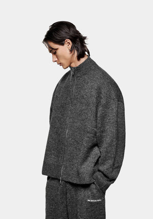 Mohair Blend Knit Track Jacket in Charcoal by MKI MIYUKI ZOKU at EQVVS Menswear. Side Model Shot. 