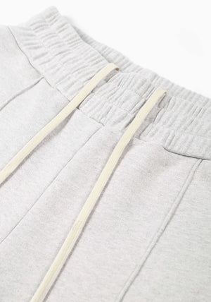 Superweight Wide Leg Joggers in Grey by MKI Miyuki Zoku at EQVVS. Detail Shot. 