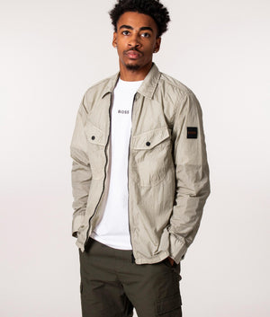 BOSS Zip Through Lovel 8 Overshirt in Grey, EQVVS. Model front. 