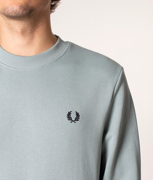 Fred Perry Crew Neck Sweatshirt in Blue at EQVVS. Detail Shot. 