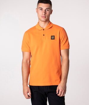 Orange stone island on sale polo