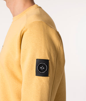 Siren Crew Sweat in Mustard by Marshall Artist at EQVVS Model Sleeve Detail